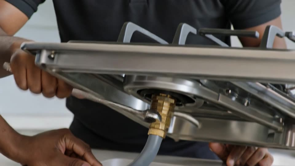 Gas Installers Cape Town - LPG gas hob connection being made by a registered gas installer